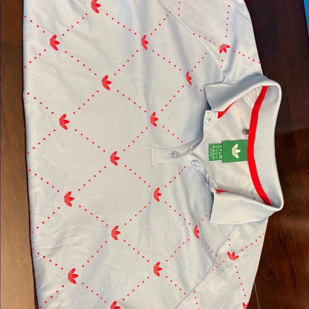 adidas women’s Light blue Polo Shirt with Red Trefoil Pattern